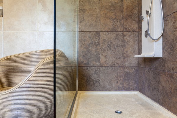 Porcelain shower base in a bathroom